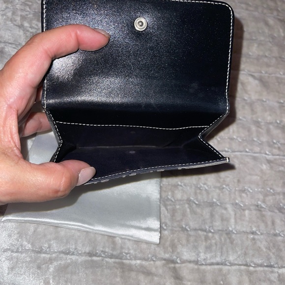 Fendi Zucca short wallet excellent condition size is 5X3 1/2” black with silver - Picture 9 of 9